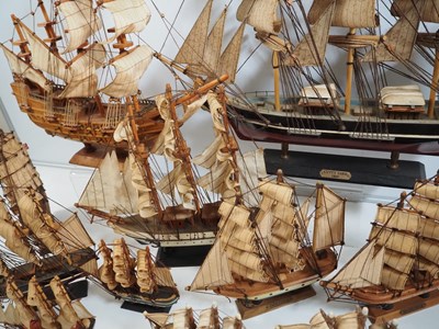 Lot 219 - A large flotilla of model ships together with...