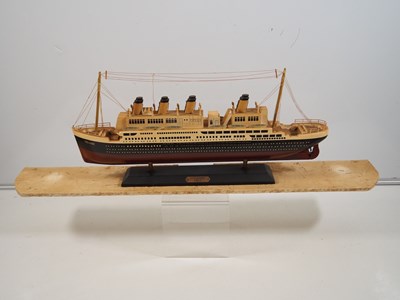 Lot 220 - A group of Titanic souvenirs / replica...