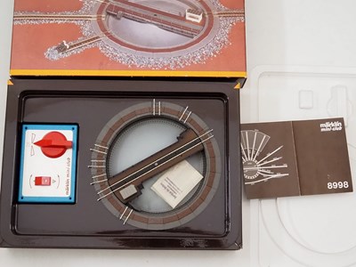 Lot 245 - A group of MARKLIN Z gauge accessories to...