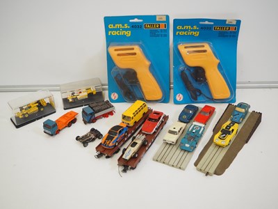 Lot 342 - A selection of FALLER AMS HO gauge slot car...