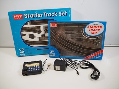 Lot 561 - A pair of PECO OO gauge Starter Track Sets...