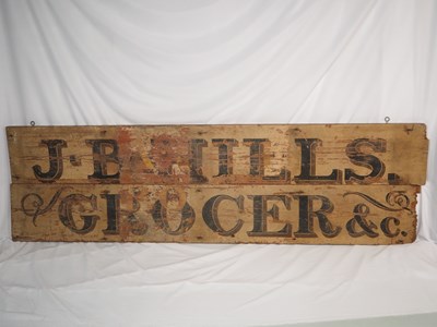 Lot 263 - A vintage wooden shop sign reading 'J. B....