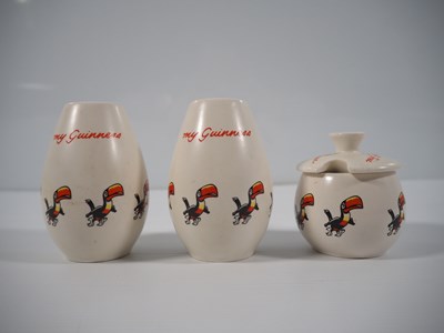 Lot 395 - GUINNESS - Carlton Ware - Three piece cruet...