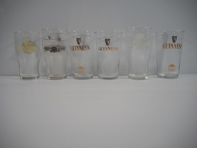 Lot 409 - A group of 16 Guinness drinking glasses of...