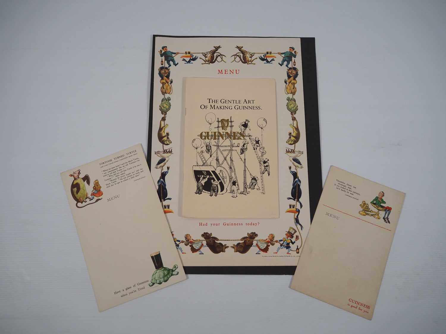 Lot 422 - A large format GUINNESS menu card together...