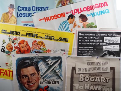 Lot 134 - A collection of six vintage rolled cinema to...