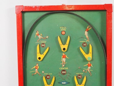 Lot 285 - A Vintage Football themed bagatelle game made...