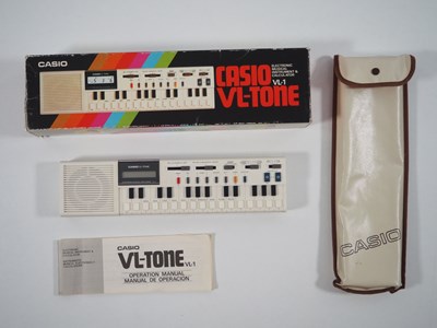 Lot 299 - A CASIO VL-Tone VL-1 electronic keyboard -...