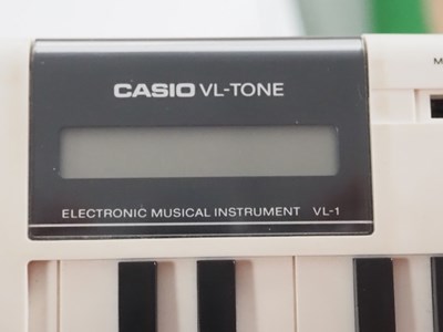 Lot 299 - A CASIO VL-Tone VL-1 electronic keyboard -...