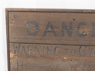 Lot 310 - An early-20th century railway crossing sign...