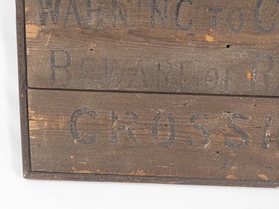 Lot 310 - An early-20th century railway crossing sign...