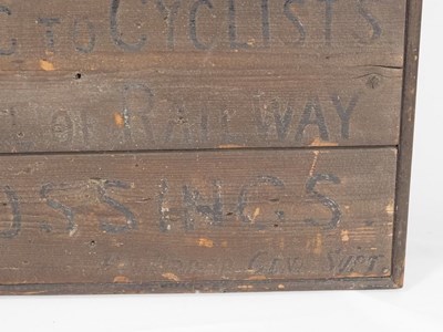 Lot 310 - An early-20th century railway crossing sign...