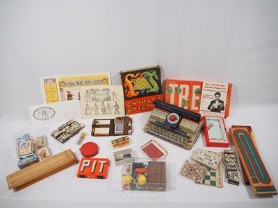 Lot 365 - A collection of vintage toys to include Oliver...