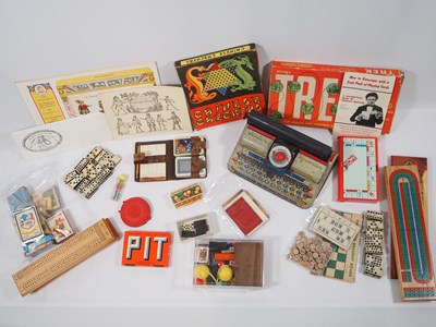 Lot 365 - A collection of vintage toys to include Oliver...