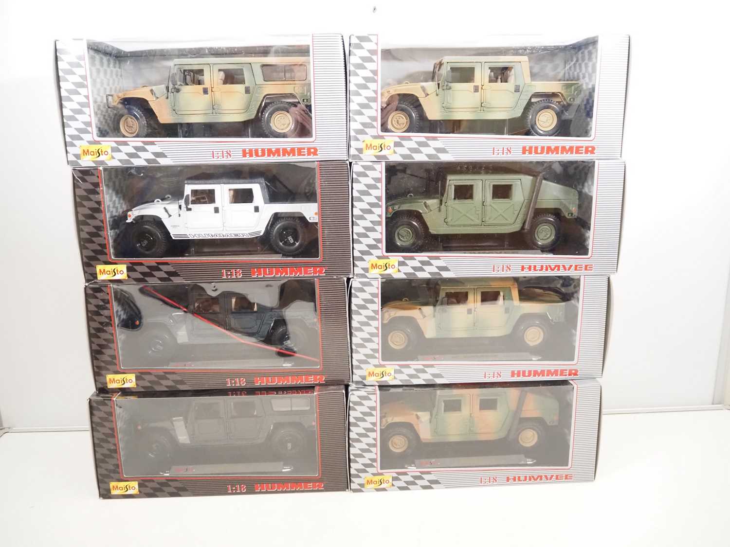 Lot 12 - A group of MAISTO 1:18 scale diecast Hummers...