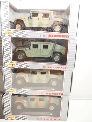 Lot 12 - A group of MAISTO 1:18 scale diecast Hummers...