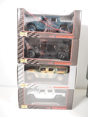 Lot 12 - A group of MAISTO 1:18 scale diecast Hummers...