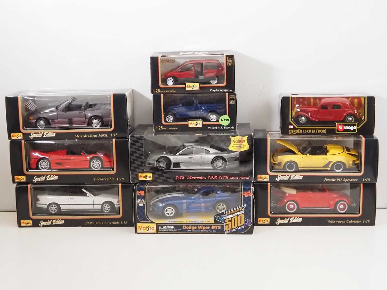 Lot 115 - A group of 1:18 and 1:26 scale diecast cars by...