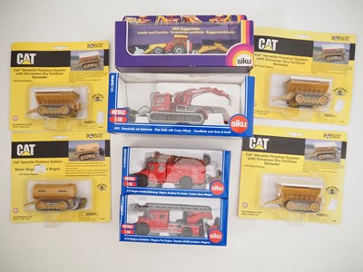 Lot 126 - A group of 1:50 scale diecast vehicles by SIKU...