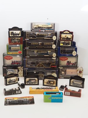 Lot 234 - A group of diecast vans and lorries all in...