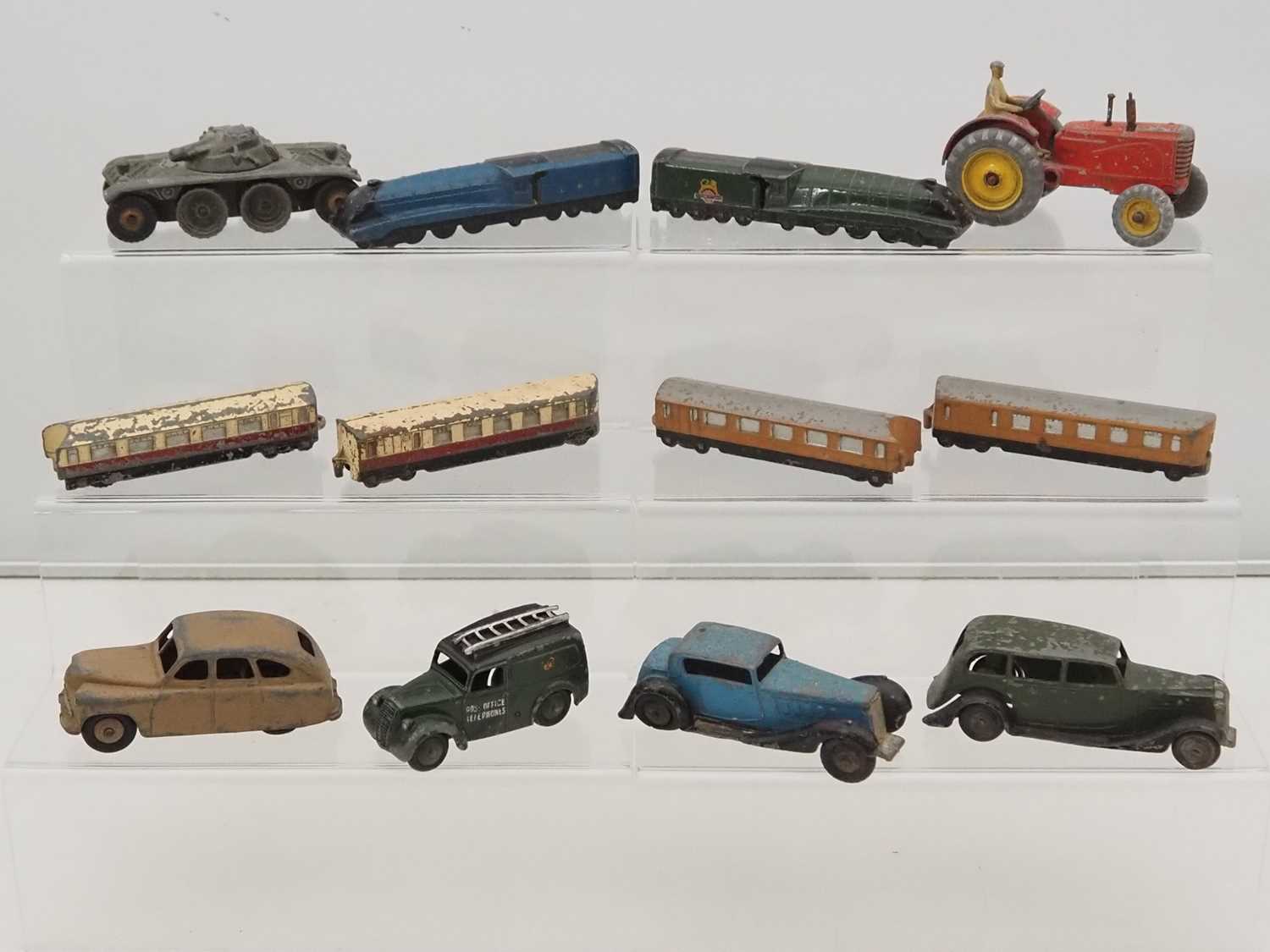 Lot 273 - A small group of playworn DINKY diecast cars...