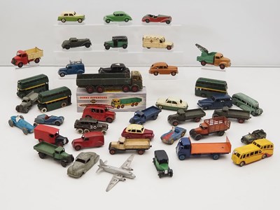 Lot 277 - A large group of playworn DINKY cars, buses...