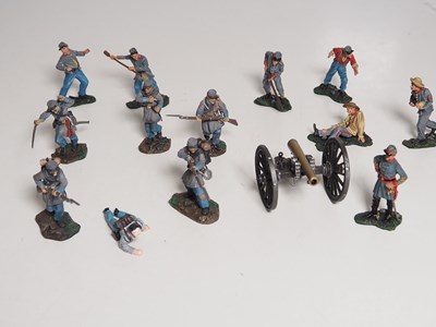 Lot 321 - A group of unboxed figures and a cannon by...