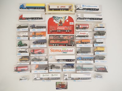 Lot 413 - A large quantity of HO scale lorries and vans,...