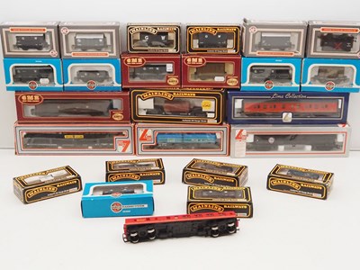 Lot 478 - A group of OO gauge vans and wagons by AIRFIX,...