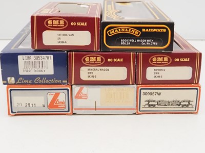 Lot 478 - A group of OO gauge vans and wagons by AIRFIX,...