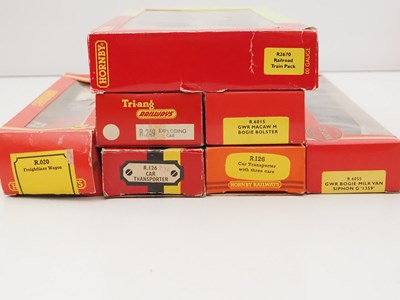 Lot 479 - A group of HORNBY OO gauge wagons and vans...