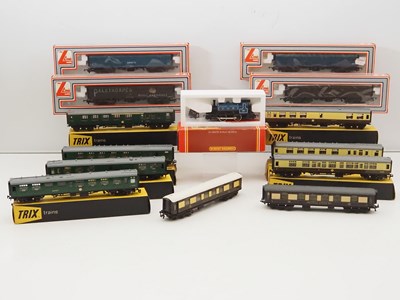 Lot 501 - A group of OO gauge rolling stock by HORNBY,...