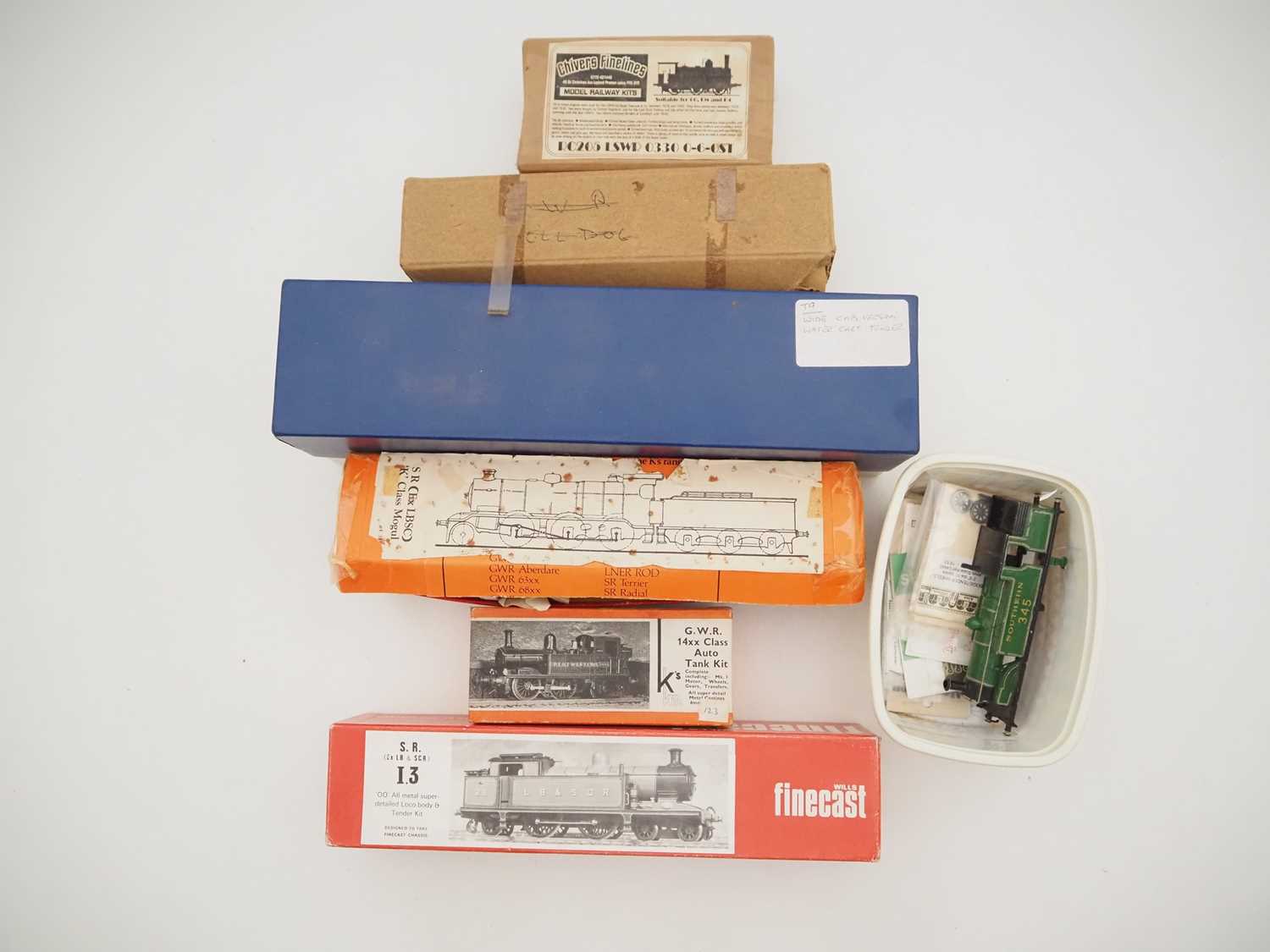 Lot 518 - A group of OO gauge part built white metal...