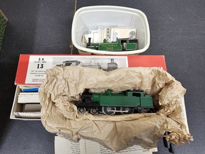 Lot 518 - A group of OO gauge part built white metal...