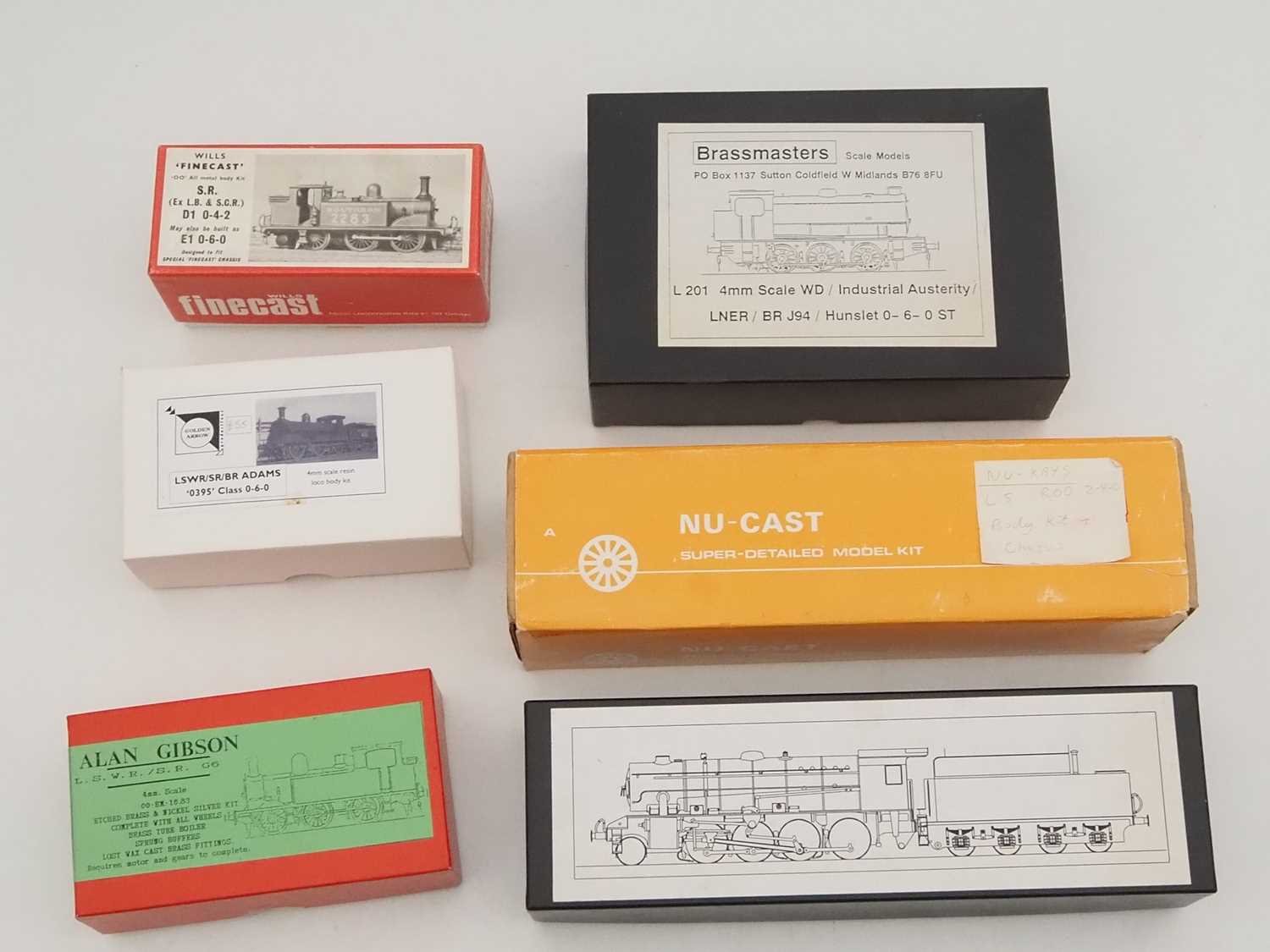 Lot 519 - A group of OO gauge brass and white metal...