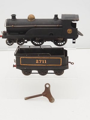 Lot 587 - A HORNBY O gauge No.2 4-4-0 clockwork steam...