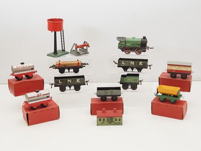 Lot 588 - A quantity of HORNBY O gauge clockwork rolling...