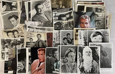 Lot 338 - A collection of male movie star autographs on...