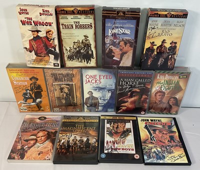 Lot 299 - A collection of autographed Western movie VHS...