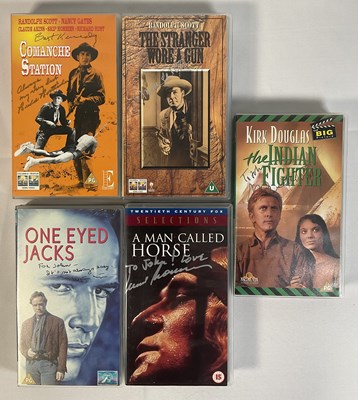 Lot 299 - A collection of autographed Western movie VHS...