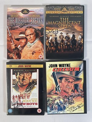 Lot 299 - A collection of autographed Western movie VHS...