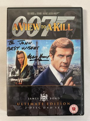 Lot 384 - A group of 6 autographed James Bond DVDs...