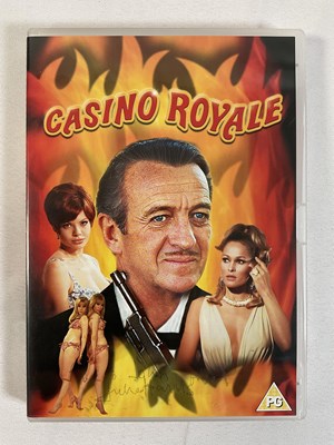 Lot 384 - A group of 6 autographed James Bond DVDs...