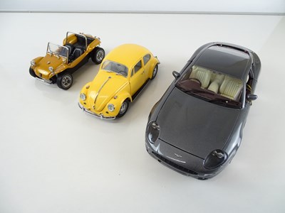 Lot 147 - A group of diecast cars in 1:24 and 1:18 Scale...