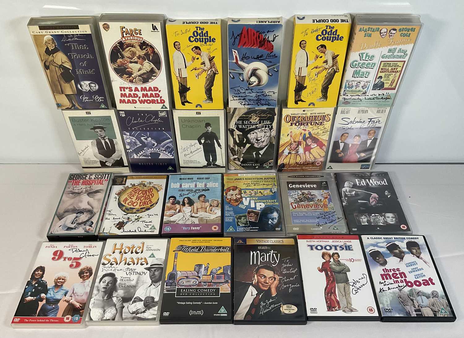 Lot 274 - A collection of autographed comedy VHS tapes