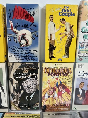 Lot 274 - A collection of autographed comedy VHS tapes...