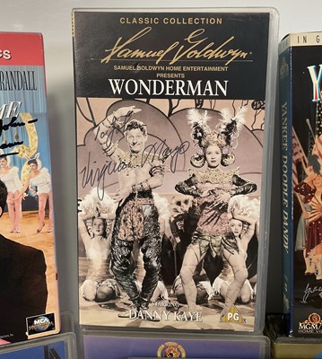 Lot 297 - A collection of autographed Musical VHS tapes...