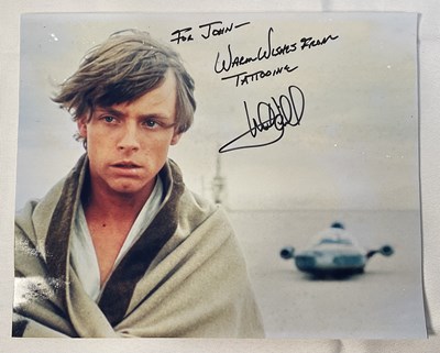 Lot 347 - An autographed promotional still from STAR...