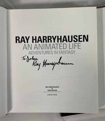 Lot 254 - Two autographed books signed by RAY...