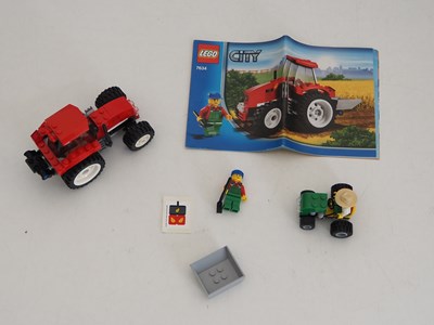 Lot 41 - A pair of LEGO CITY Tractors comprising 4899...